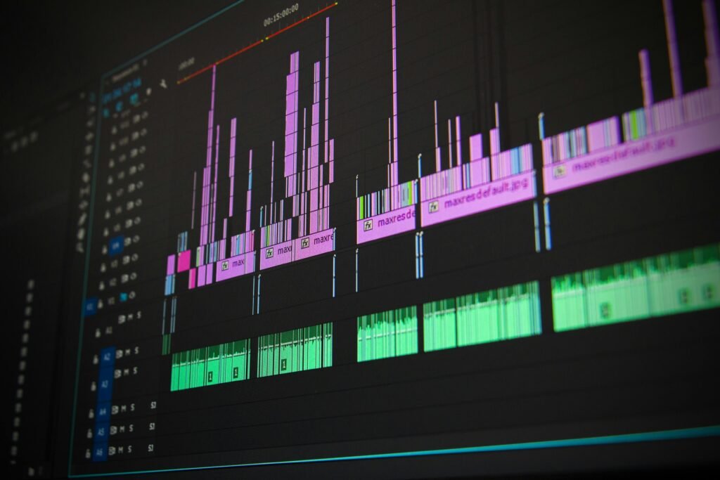 Home Close-up of a professional audio and video editing software interface with waveform displays.